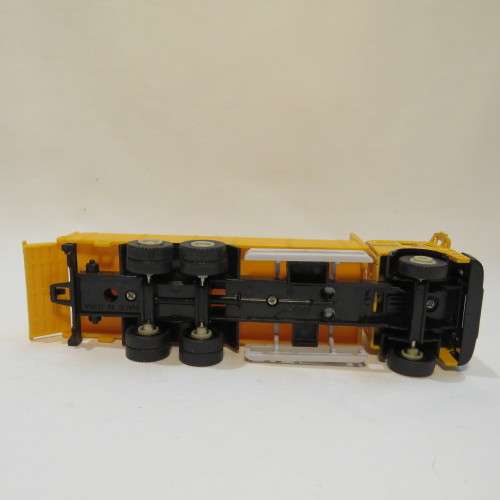Die-cast and plastic construction truck model
