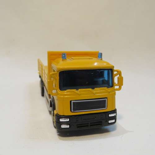 Die-cast and plastic construction truck model