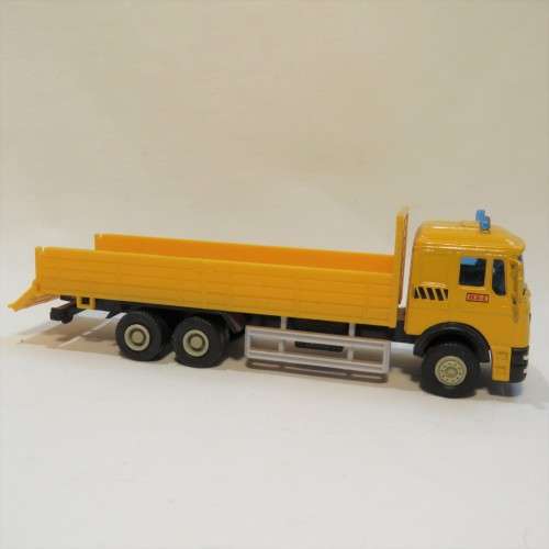 Die-cast and plastic construction truck model