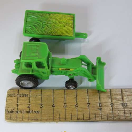 M.Farm plastic toy tractor with corn trailer