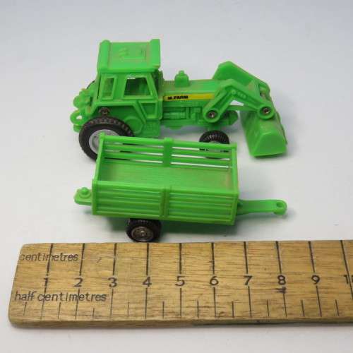 New-Ray M.Farm plastic toy tractor and trailer