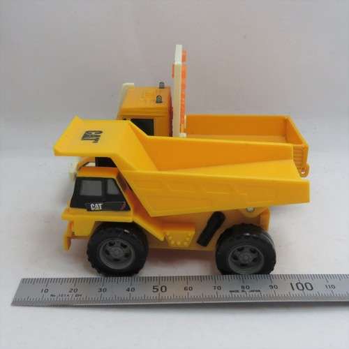 Pair of construction toy trucks