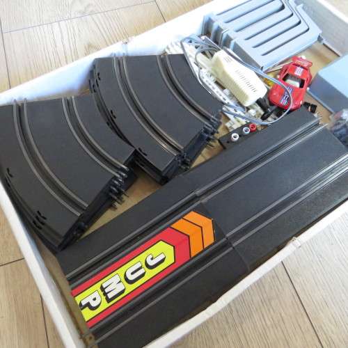 Box with parts for Speedtrax slot car battery operated set - Only 1 car and controller