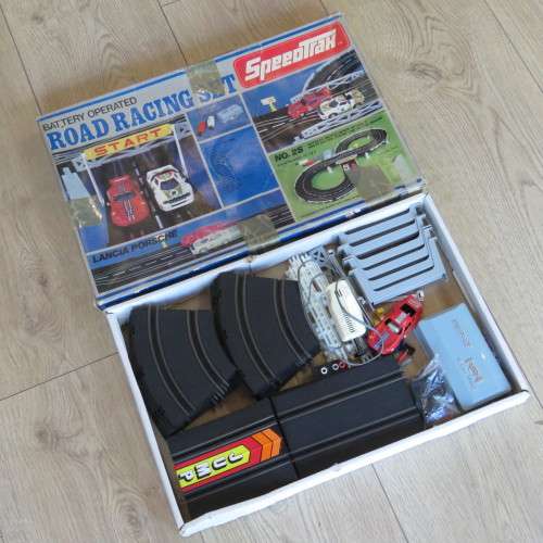 Box with parts for Speedtrax slot car battery operated set - Only 1 car and controller
