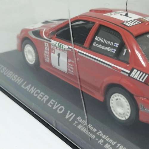 Mitsubishi Lancer Evo VI die-cast rally model car -1999 New Zealand rally -case cracked - scale 1/43