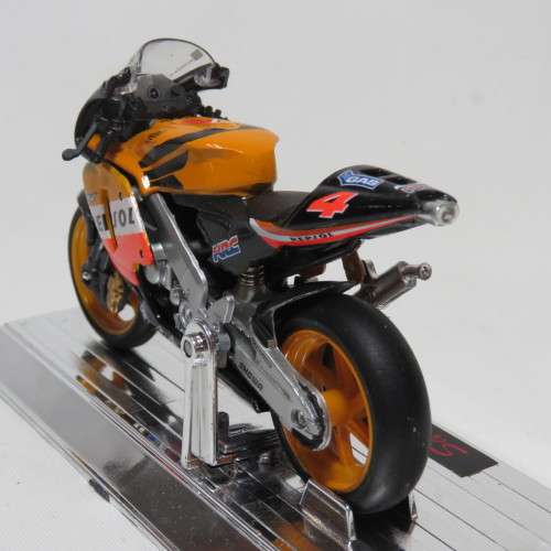 Saico 2004 Honda RCV 211 Repsol MotoGP die-cast motorcycle - #4 Alex Barros - Scale 1/18 in box