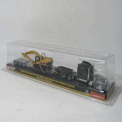 Norscot Peterbilt model 389 with trail king Lowboy trailer and CAT 315C
