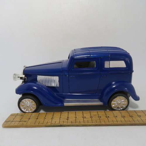 Musical Battery operated toy car - Lights, sound and opening roof and doors