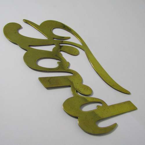 Antique brass Ford Model T radiator grille badge