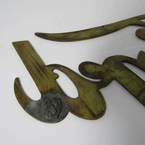 Antique brass Ford Model T radiator grille badge
