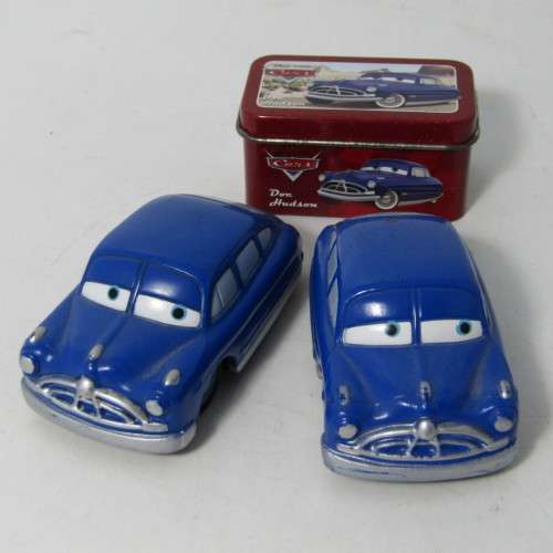 Disney Cars Doc Hudson toy cars and tin