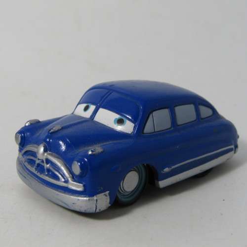 Disney Cars Doc Hudson toy cars and tin