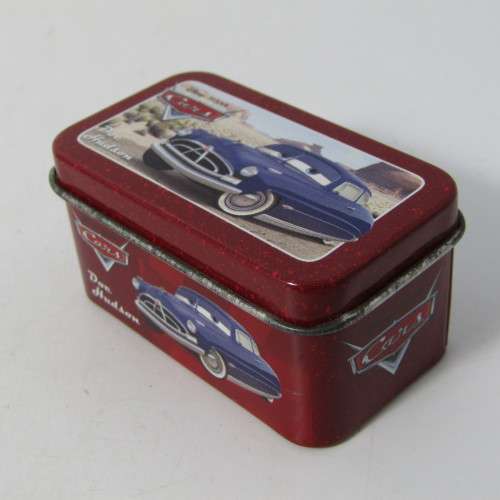 Disney Cars Doc Hudson toy cars and tin