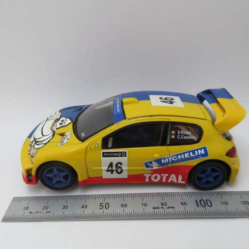 SCX Peugeot 206 WRC slot car - Wing repaired, mirrors missing - 4 wheel drive