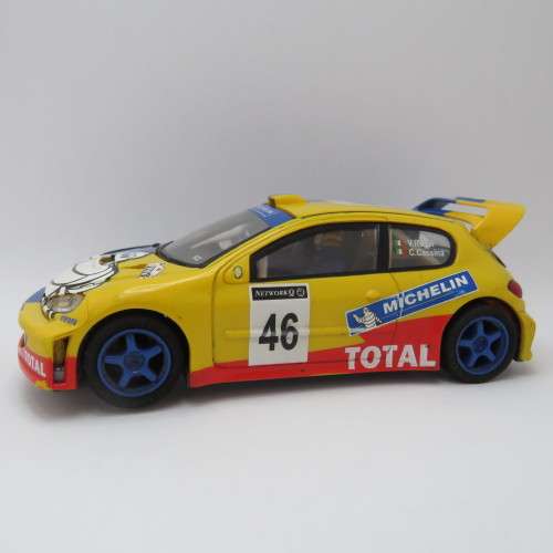 SCX Peugeot 206 WRC slot car - Wing repaired, mirrors missing - 4 wheel drive