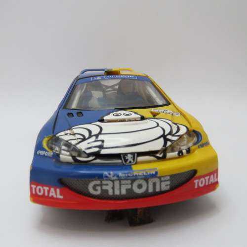 SCX Peugeot 206 WRC slot car - Wing repaired, mirrors missing - 4 wheel drive