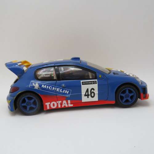 SCX Peugeot 206 WRC slot car - Wing repaired, mirrors missing - 4 wheel drive