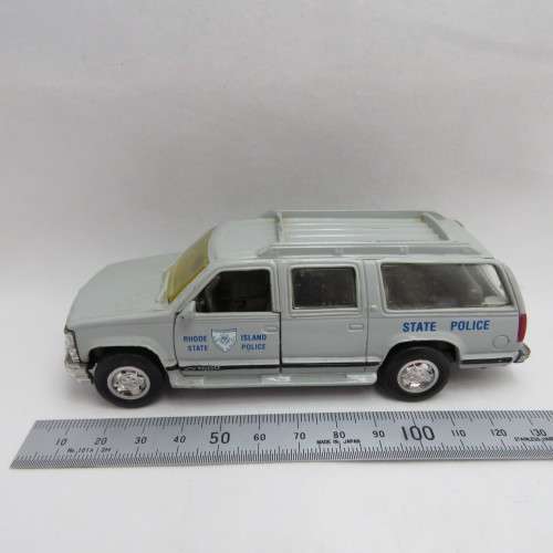 Road Champs Chevrolet Suburban truck - Rhode Island State Police - Rear window missing