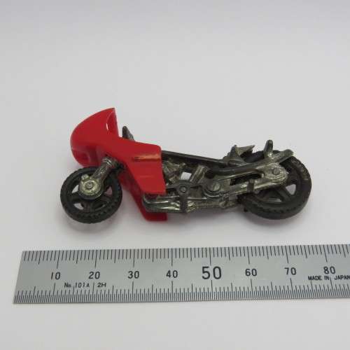 Vintage Corgi Geoffrey motorcycle of Pink Panther - Side rockets missing