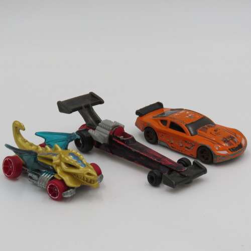 Lot of 7 Hot Wheels toy cars - Well used