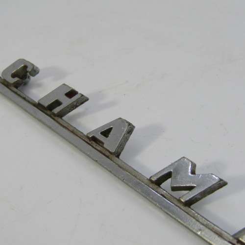 Vintage Champion car badge