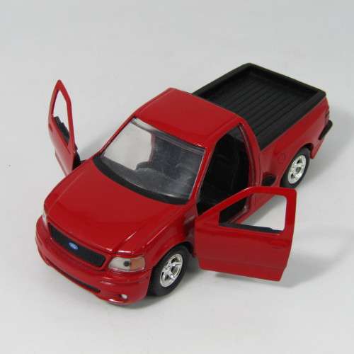 Jada Toys 1999 F-150 SVT Lighting model car - scale 1/32