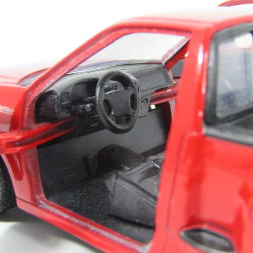 Jada Toys 1999 F-150 SVT Lighting model car - scale 1/32