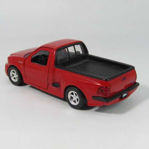 Jada Toys 1999 F-150 SVT Lighting model car - scale 1/32