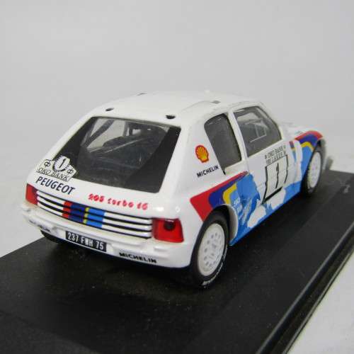 Peugeot 205 T16 Evodie-cast rally model car - scale 1/43 - rear spoiler missing