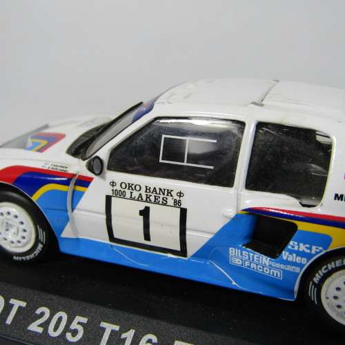 Peugeot 205 T16 Evodie-cast rally model car - scale 1/43 - rear spoiler missing