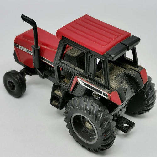 ERTL Case International 2594 tractor with case 8610 bale processor trailer