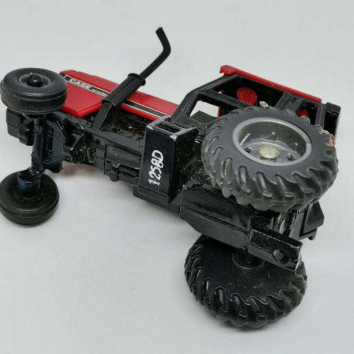 ERTL Case International 2594 tractor with case 8610 bale processor trailer