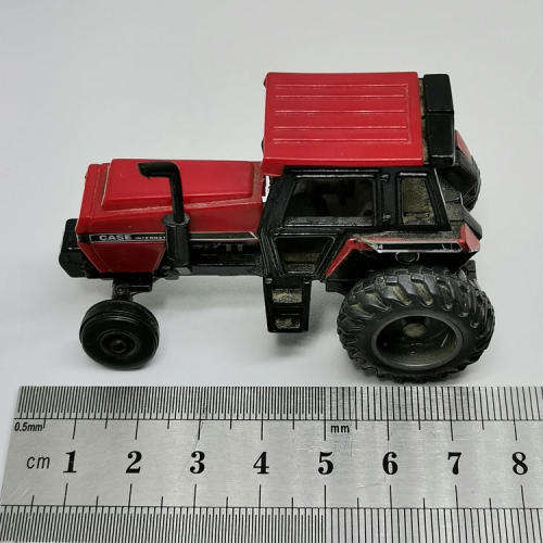 ERTL Case International 2594 tractor with case 8610 bale processor trailer