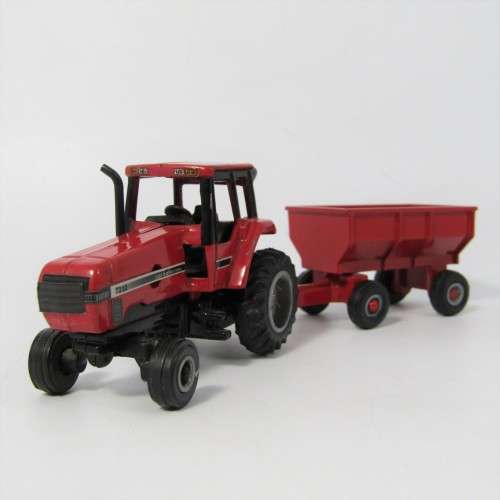 ERTL CASE International 7210 die-cast tractor with trailer - scale 1/64