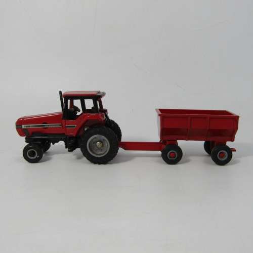 ERTL CASE International 7210 die-cast tractor with trailer - scale 1/64