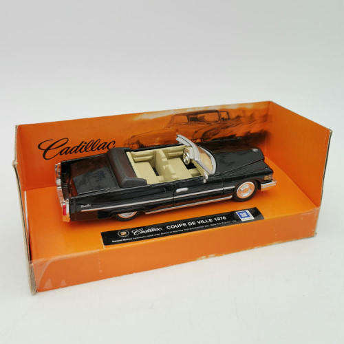 NewRay 1976 Cadillac Coupe de Ville die-cast model car - Scale 1/43