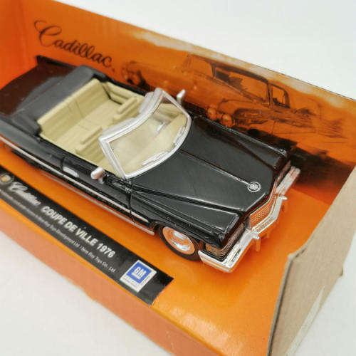NewRay 1976 Cadillac Coupe de Ville die-cast model car - Scale 1/43