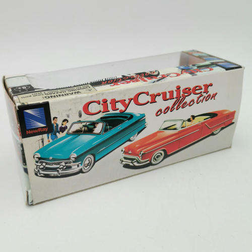 NewRay 1976 Cadillac Coupe de Ville die-cast model car - Scale 1/43