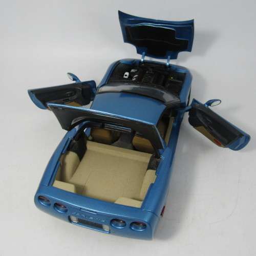 UT Models 1998 Chevrolet Corvette die-cast model car with removable roof - scale 1/18
