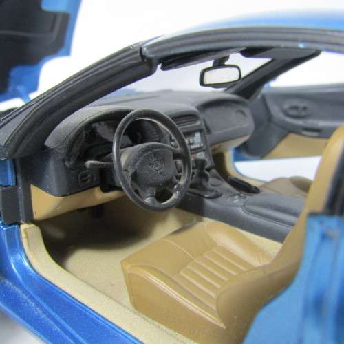 UT Models 1998 Chevrolet Corvette die-cast model car with removable roof - scale 1/18