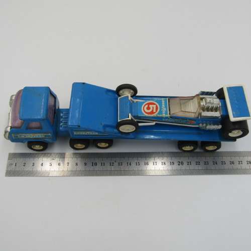 Vintage Buddy L pressed steel truck with dragster