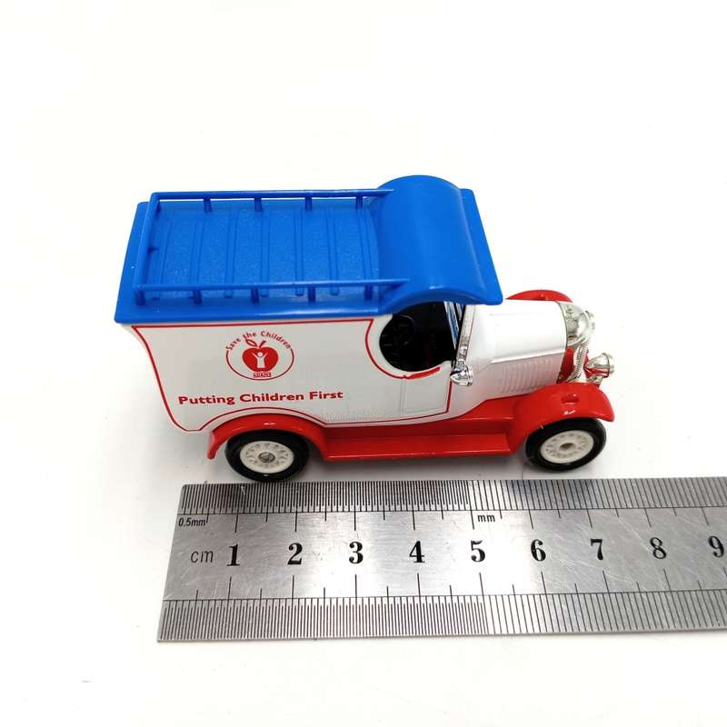 Lledo Morris van with Adams childrenswear specialist advertising in box