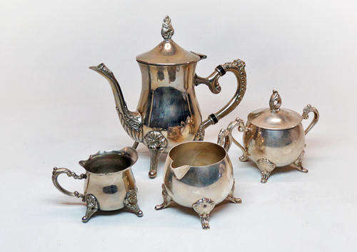 Vintage silver plated tea set with sugar-, milk- and cream jugs
