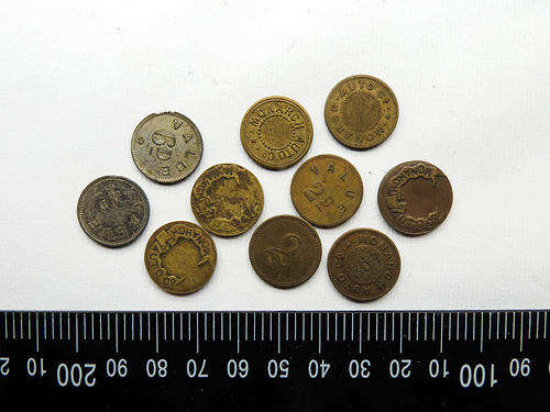 Lot of Monarch Auto Co. tokens