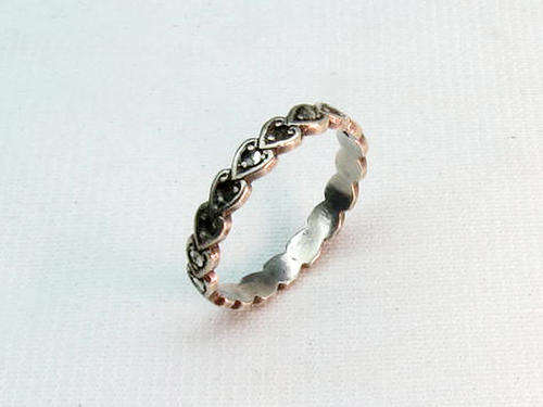Vintage ring with unknown stones -might be small black diamonds