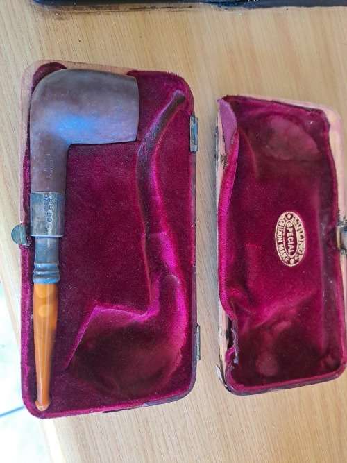 vintage  silver smoking pipe. and lighter