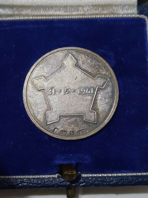 Silver medal proof