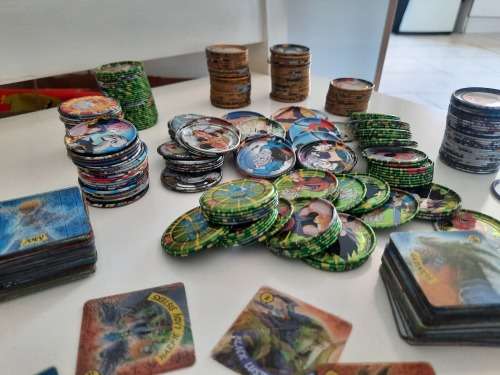 Tin metal Tazos 283in total plus 114 simba tv cards yu -gi -oh