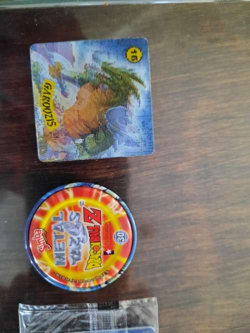 Tin metal Tazos 283in total plus 114 simba tv cards yu -gi -oh