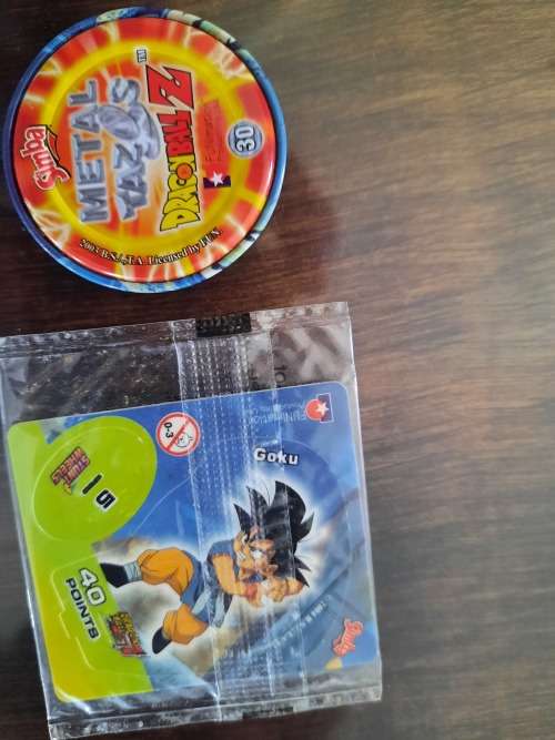 Tin metal Tazos 283in total plus 114 simba tv cards yu -gi -oh